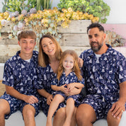 Navy blue kaftans featuring festive white reindeer print, perfect for tropical holiday gatherings. | Tropicool Clothing
