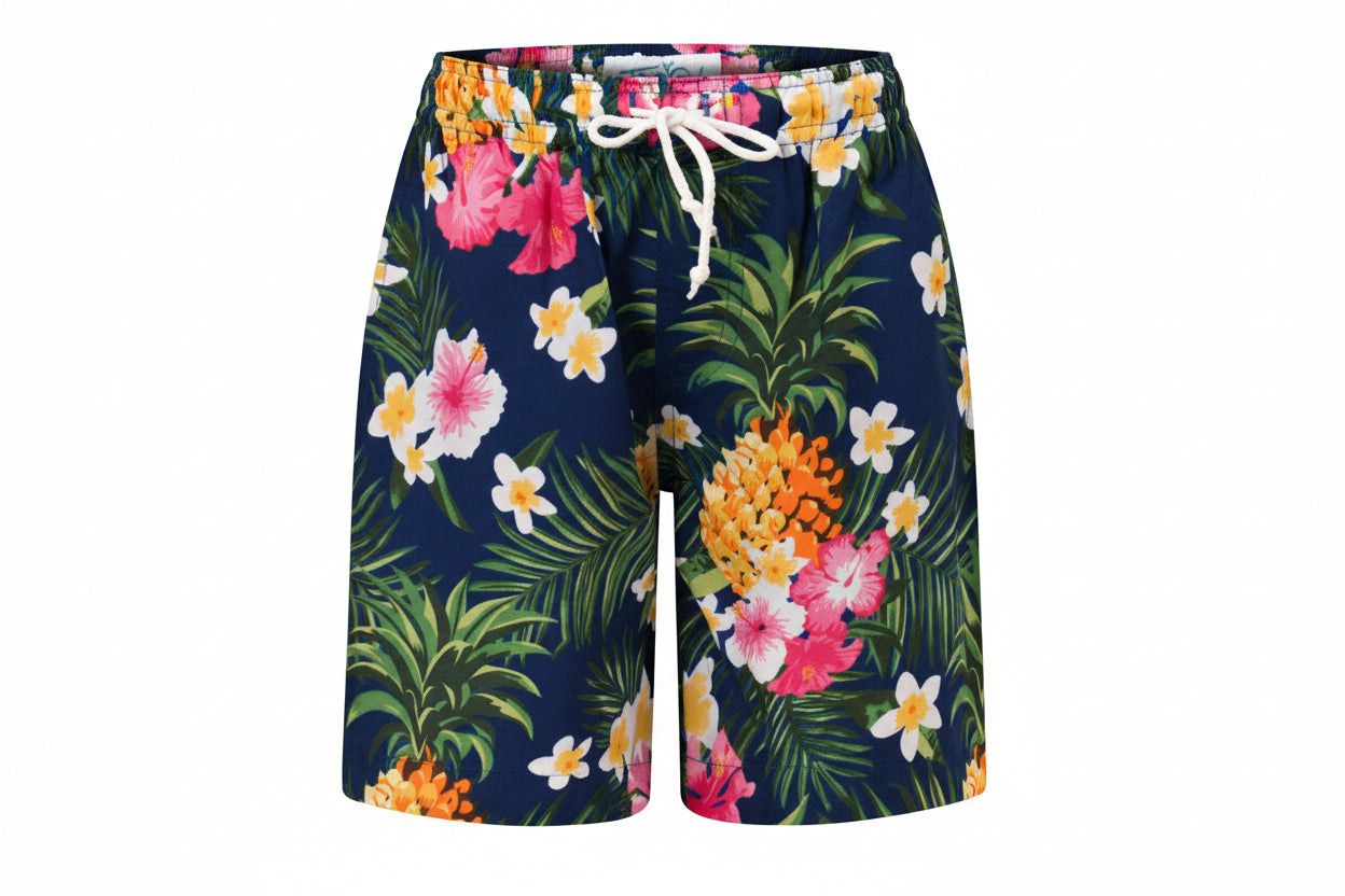 Navy blue kids shorts with tropical pineapple pattern, elastic waistband, and white drawstring. Festive style. | Tropicool Clothing