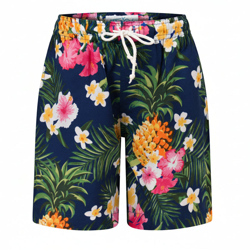 Navy blue kids shorts with tropical pineapple pattern, elastic waistband, and white drawstring. Festive style. | Tropicool Clothing