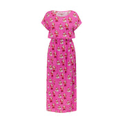 Pink maxi dress with white polka dots, short sleeves, gathered waist, festive Christmas cartoon print. | Tropicool Clothing