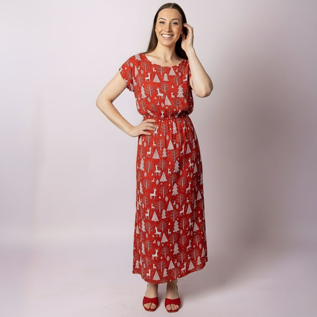 Woman wearing the Celyn Reindeer Red Adult Christmas Dress by Tropicool — lightweight Aussie-summer fabric, comfy fit, perfect for family matching, parties and festive events.