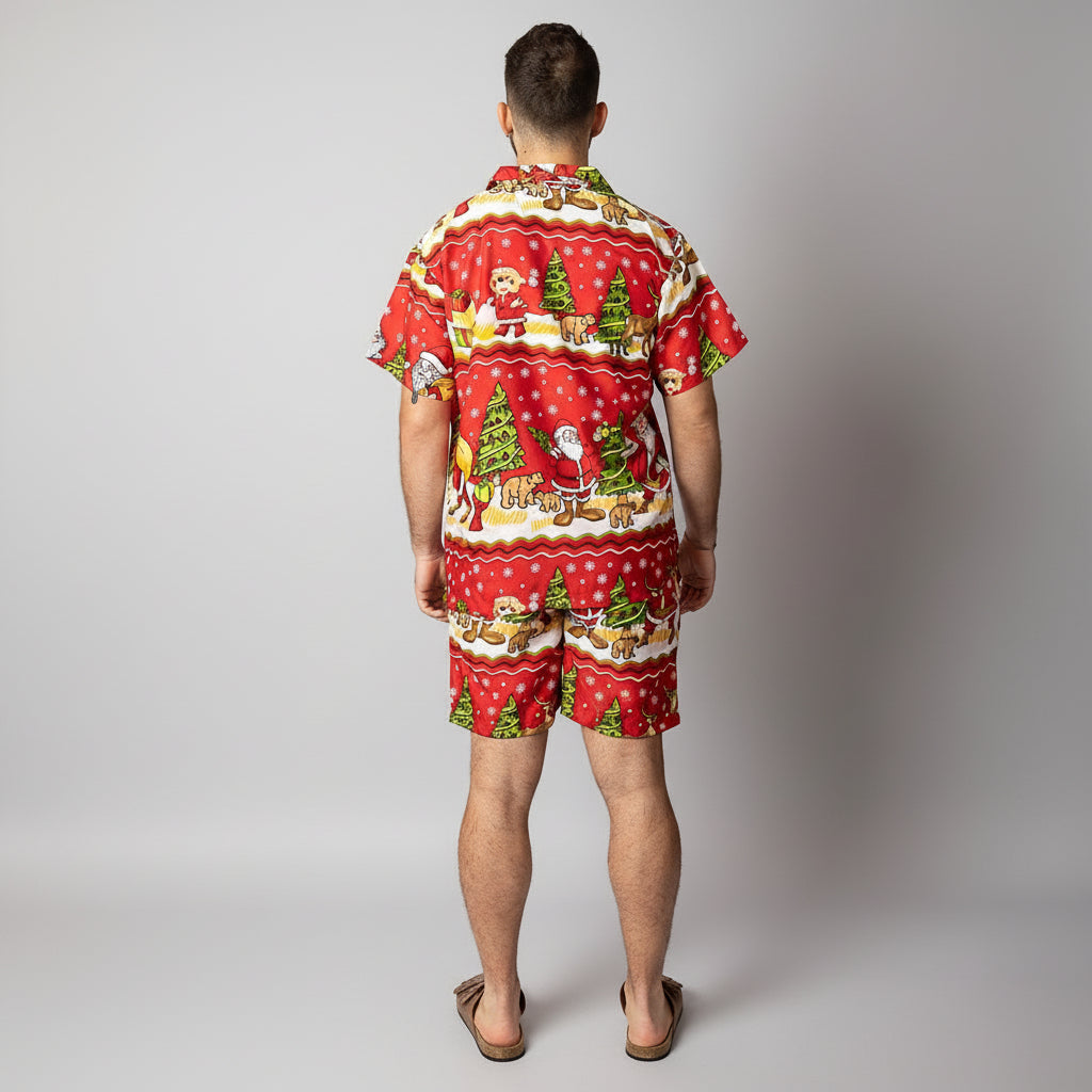 Back view of the Tropicool Happy Santa Red adult Christmas shirt and shorts set, featuring bold red festive prints with Santa and Christmas trees. Lightweight and comfortable for Aussie summer celebrations.