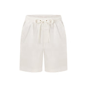 White knee-length cotton kids shorts with elastic waist, drawstring, and side pockets; tropical casual style. | Tropicool Clothing