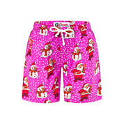 Pink Christmas kids shorts with Santa and snowman print, white drawstring, and snowy polka dot pattern. | Tropicool Clothing