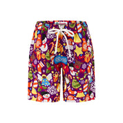 Purple kids shorts with tropical holiday patterns, featuring festive motifs for Christmas. | Tropicool Clothing